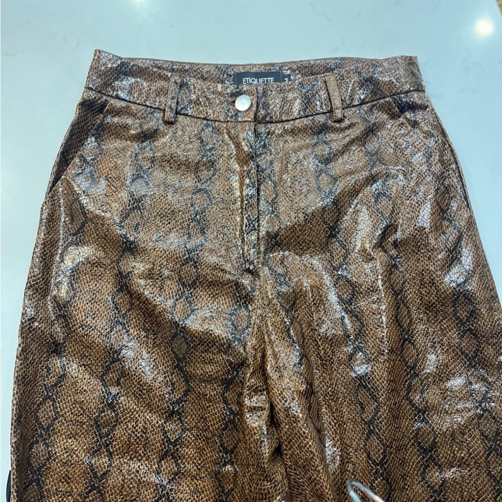 Etiquette Clothiers Brown Snake Print Flare Pants